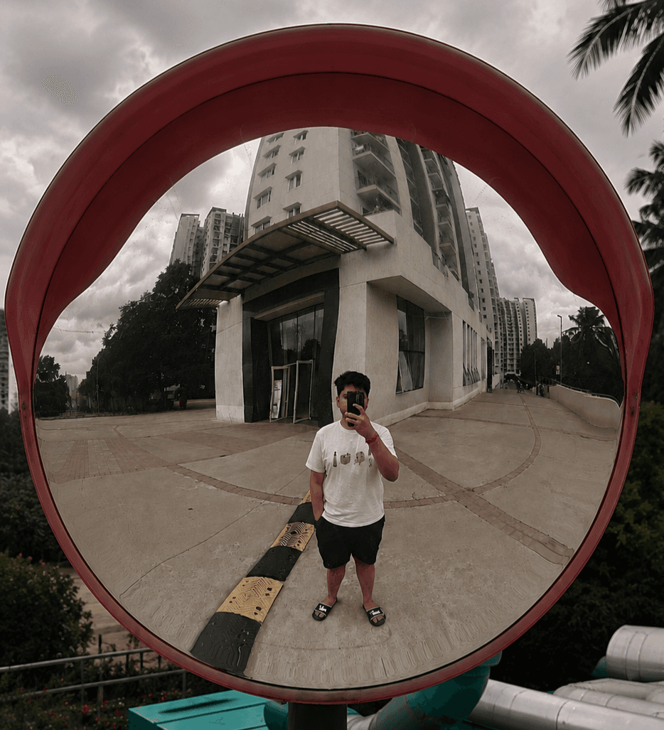 Naman as a kid, in a red paper hat